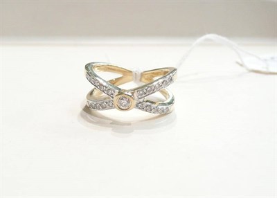 Lot 122 - A diamond crossover fancy ring