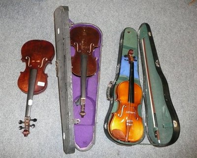 Lot 131 - Three violins with two bows - two cased