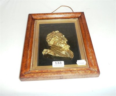 Lot 133 - A 19th century gilt metal bas relief portrait head in a maple frame