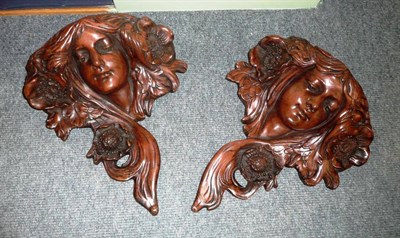 Lot 141 - Pair of Art Nouveau-style modelled terracotta wall pockets