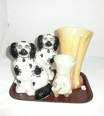 Lot 150 - Pair of Staffordshire spaniel dogs and two Clarice Cliff vases