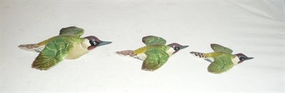 Lot 180 - Set of three graduated Beswick Green Woodpecker wall plaques, models 1344/1 (af); 1344/2 and...