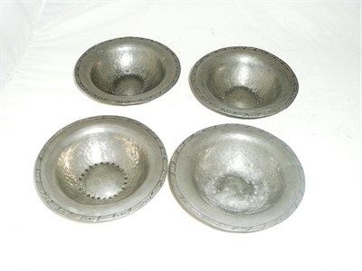 Lot 209 - Four pewter small dishes stamped Hugh Wallis