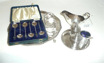 Lot 217 - A silver wine waiter, Roberts & Belk, Sheffield, a set of six coffee bean-end spoons (cased), a...