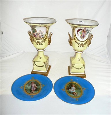 Lot 256 - Pair of 19th century yellow-ground vases marked 'Paris' and a pair of blue ground cabinet plates