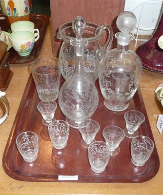 Lot 259 - Two 19th century glass decanters, similar jug, eight glasses and an engraved glass