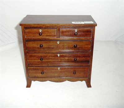 Lot 263 - Mahogany miniature chest of drawers