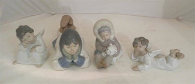 Lot 276 - Three Lladro and one Nao figure