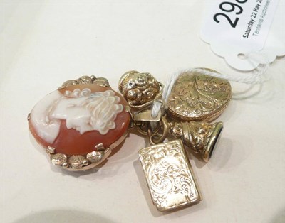 Lot 298 - Gold and cameo pendant, oval locket, book-shaped locket, pendant seal, fob seal and watch key