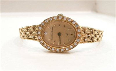 Lot 310 - 9ct gold and diamond-set lady's wristwatch, Beuche-Girod