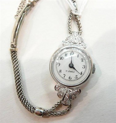 Lot 316 - A ladies platinum cased, 9ct white gold and diamond cocktail watch