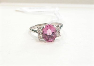 Lot 320 - A 14ct white gold, pink tourmaline and diamond ring