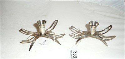 Lot 353 - Pair of silver candlestick holders