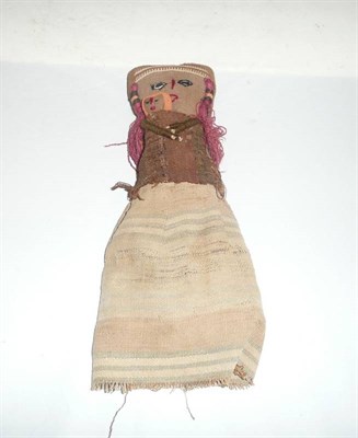 Lot 371 - A stitched fabric doll