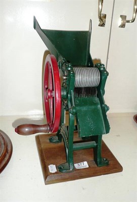 Lot 377 - A cast iron beet slicer