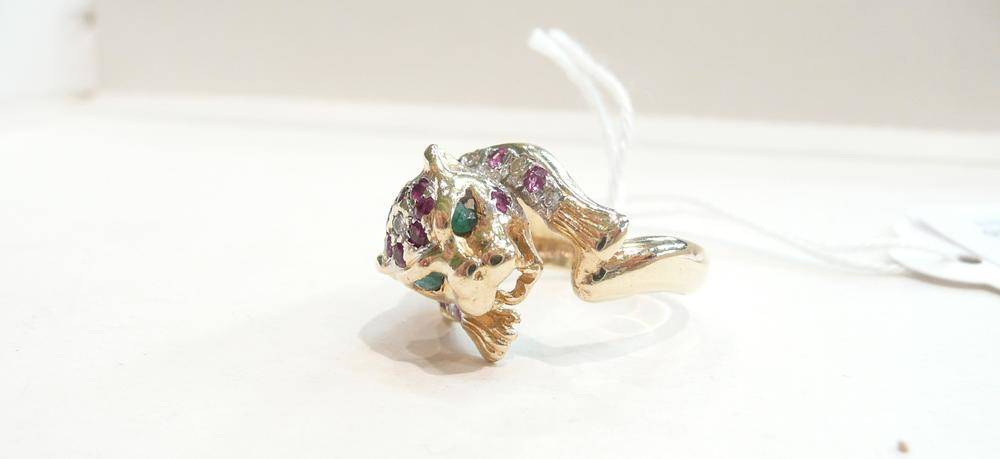 Lot 406 - A diamond, ruby and emerald panther ring (one stone missing)