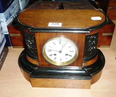 Lot 428 - A striking mantel clock