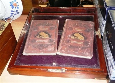 Lot 429 - A 19th century mahogany writing slope and 'Goldsmiths Animated Nature' (two volumes)