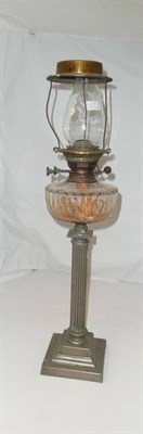 Lot 446 - A column table oil lamp