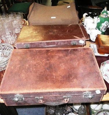 Lot 464 - A fitted vanity case and two leather cases and a riding crop, etc