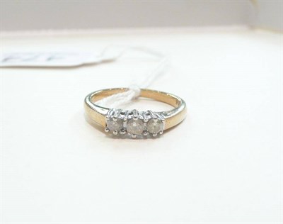 Lot 474 - A diamond three stone ring