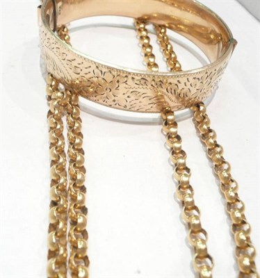 Lot 555 - Gilt guard chain and and hollow bangle