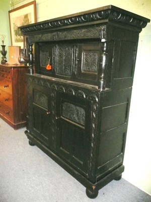 Lot 567 - Carved oak court cupboard