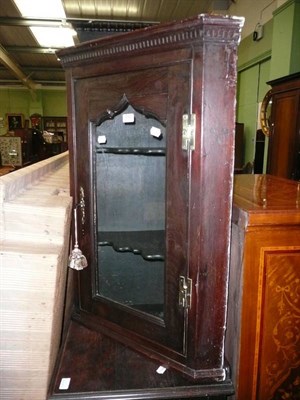 Lot 592 - Georgian mahogany glazed hanging corner cupboard