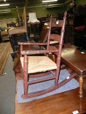 Lot 616 - 19th century child's rush-seated rocking chair