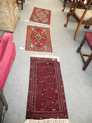 Lot 629 - A Turkman mat; and two West Persian mats (3)