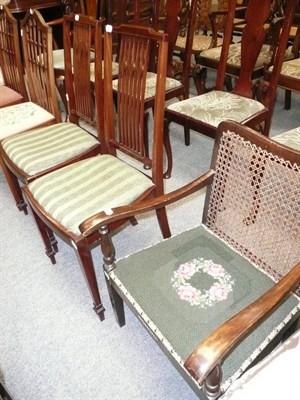 Lot 653 - Four mahogany side chairs and a bergere armchair