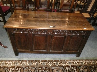 Lot 661 - 18th century carved oak coffer