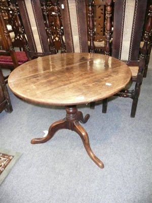 Lot 662 - Georgian oak tripod table