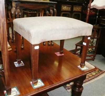 Lot 671 - A mahogany serpentine stool