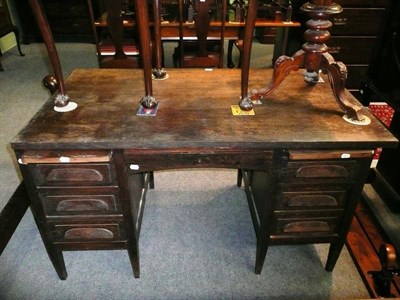 Lot 679 - An oak glazed bookcase and an oak desk