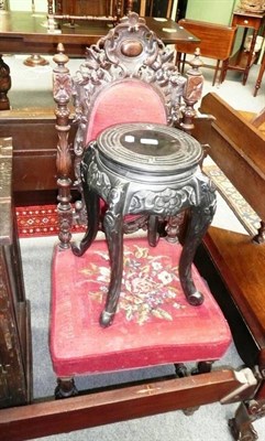 Lot 687 - An oak chair and a small hardwood stand