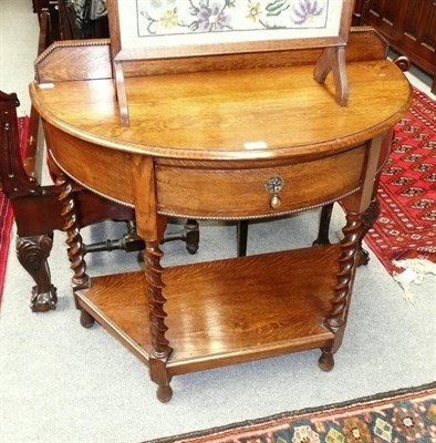 Lot 689 - 1930's oak barley twist hall table