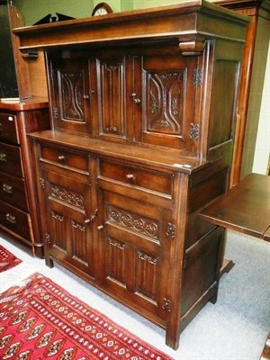 Lot 694 - Carved oak court cupboard