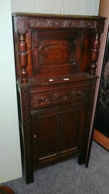 Lot 700 - Small oak press cupboard in 17th century style, with keys