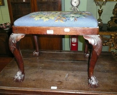 Lot 718 - An 19th/20th century mahogany claw and ball feet stool