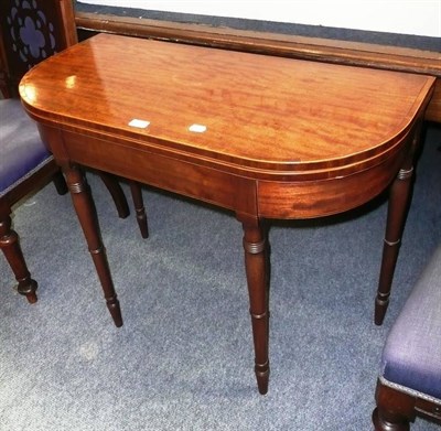 Lot 734 - Regency mahogany fold over table