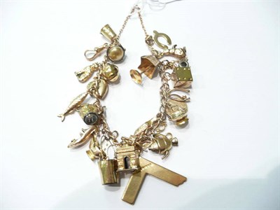 Lot 60 - 9ct charm bracelet, 37.6g