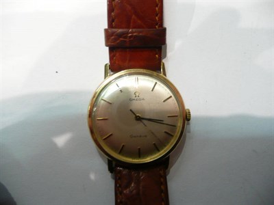 Lot 70 - A gents centre seconds wristwatch signed Omega Geneve, case back with presentation inscription