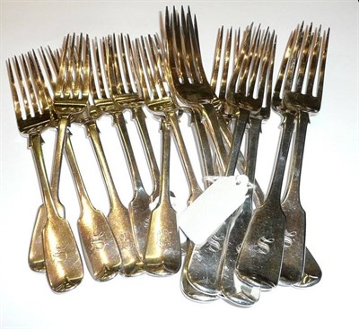 Lot 76 - Eight fiddle pattern table forks and eight dessert forks