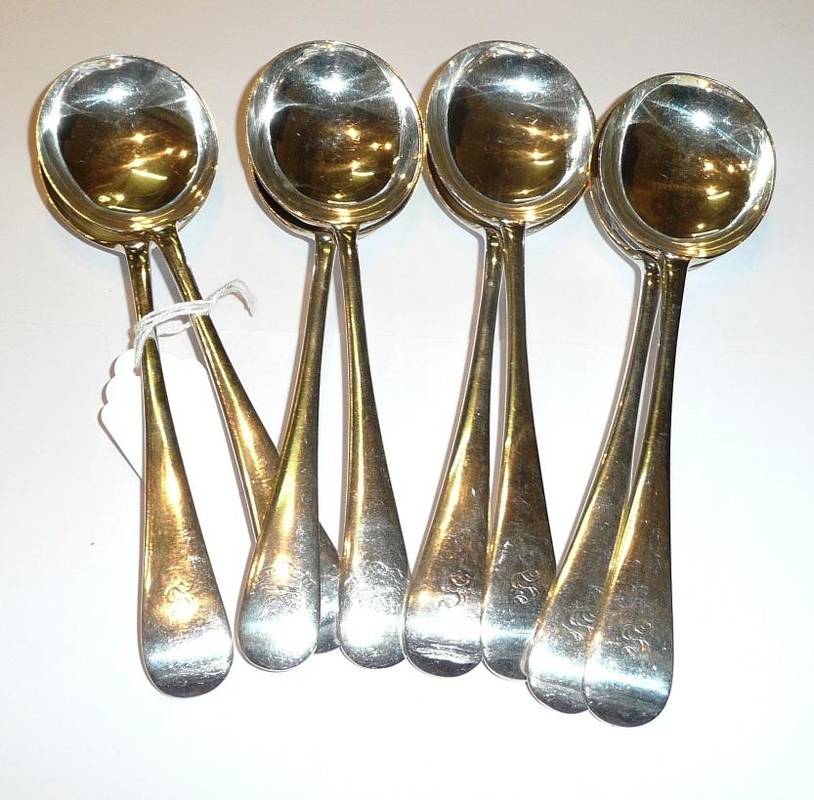 Lot 77 - Eight silver Old English soup spoons