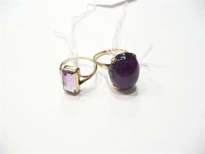 Lot 80 - A cabochon amethyst ring and another amethyst ring