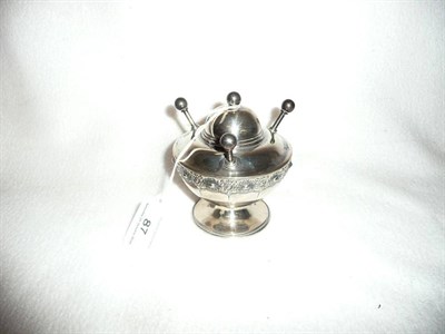 Lot 87 - A Portuguese white metal cigar lighter, of hemispherical shape with hinged cover and three...