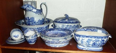 Lot 114 - A shelf of assorted blue and white printed pottery