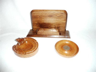 Lot 123 - An Albert "Eagleman" Jeffries oak horseshoe ashtray, with carved eagle signature (damaged),...