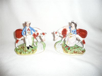 Lot 189 - Pair of Victorian Staffordshire milk maids and cows